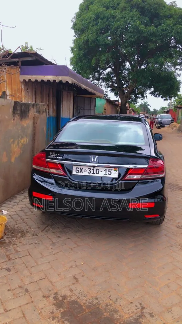 Honda Civic EX-L 4dr Sedan w/Nav (1.8L 4cyl CVT) 2014 Black · Photo 1