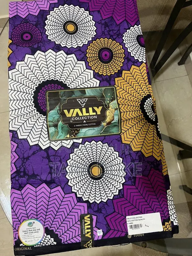 Vibrant Purple and Gold African Print · Photo 1