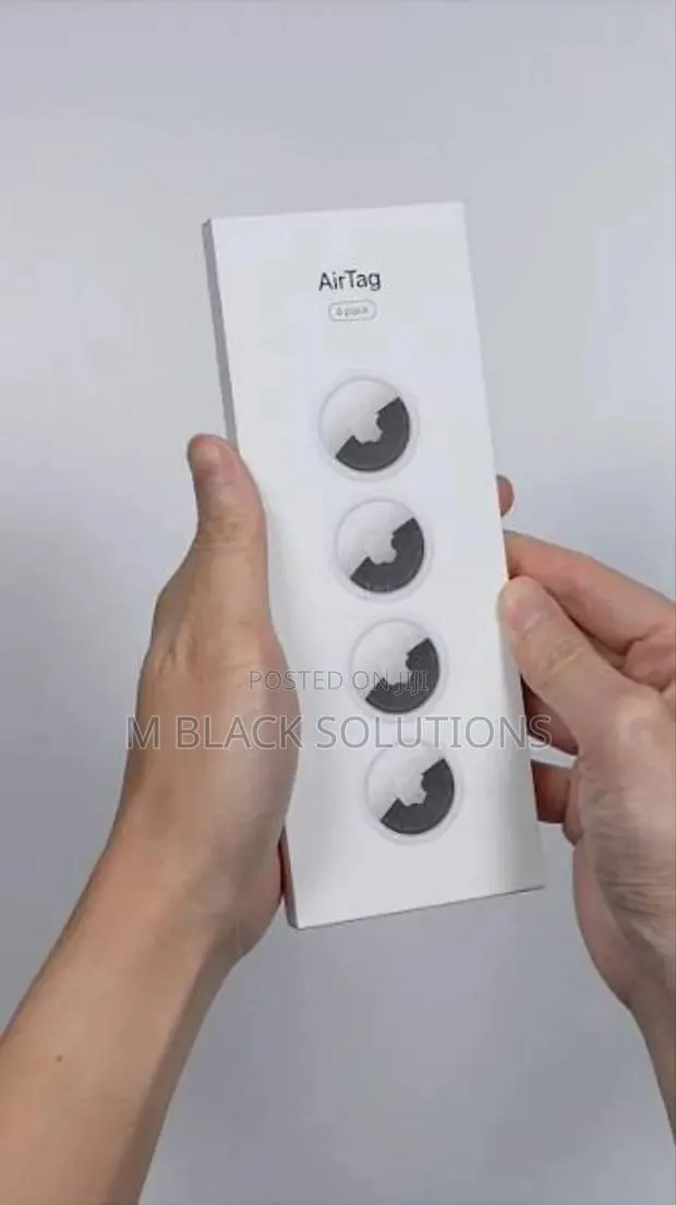 Apple - AirTag 4 Pack (2nd Generation · Photo 1