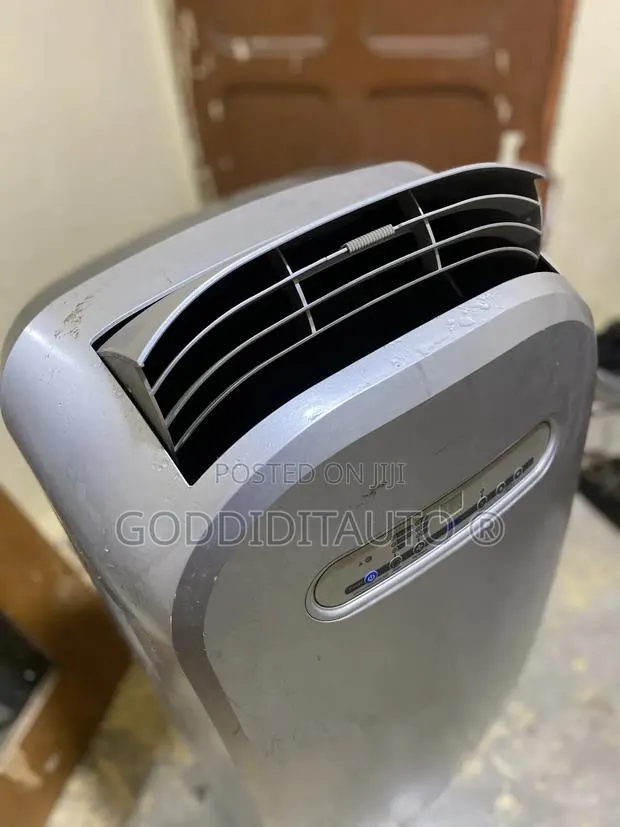 Portable Standing Air Conditioning , 1.5HP , 12,000 BTU · Photo 1