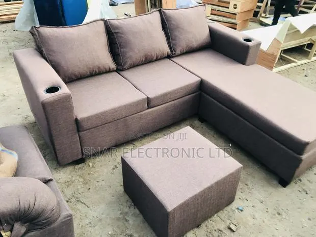 Brown L Shape Sofas Plus Table · Photo 1