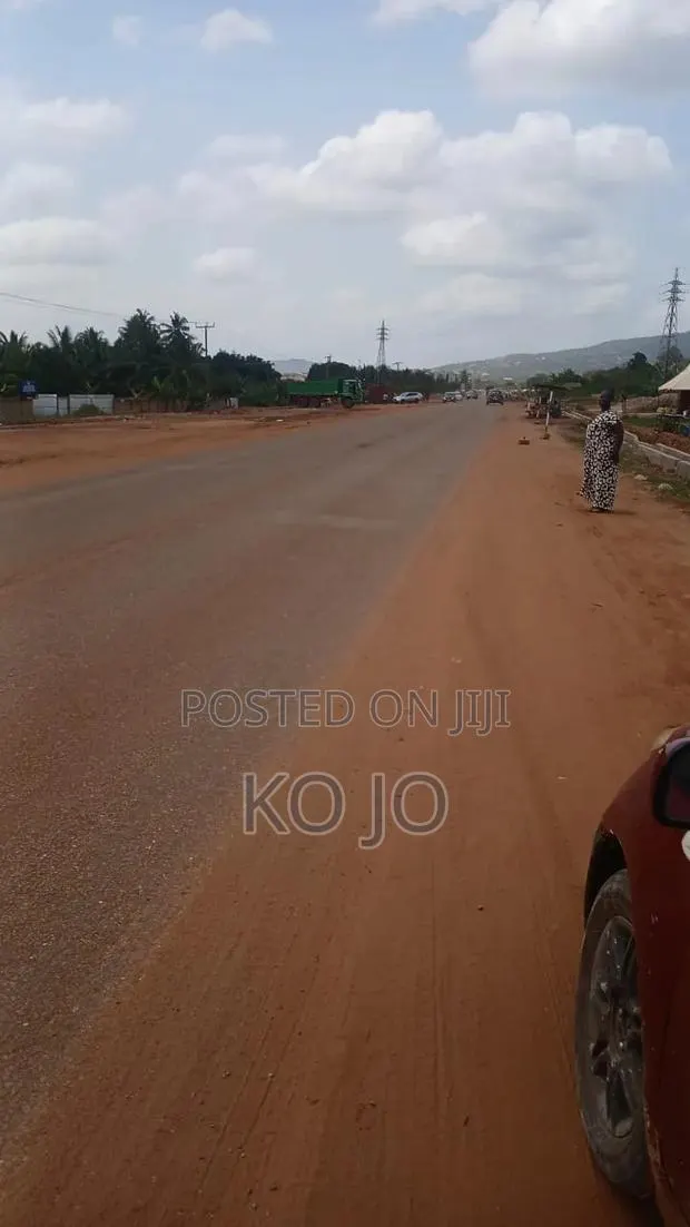 3 Plots of Titled Roadside Land at Dodowa · Photo 1