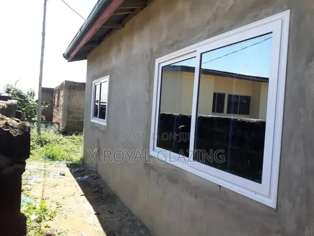 White Italian Glazing Window Well Installed · Photo 1