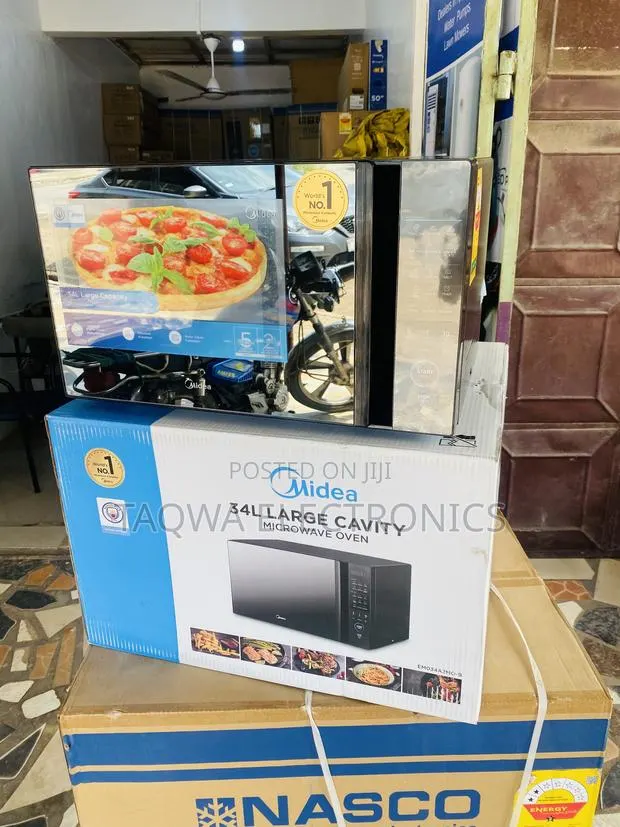34l Large Cavity Midea Microwave Oven · Photo 1