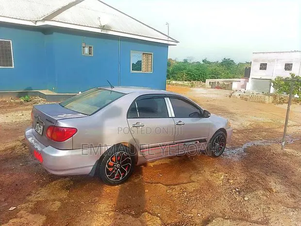 Toyota Corolla LE 2005 Beige · Photo 1