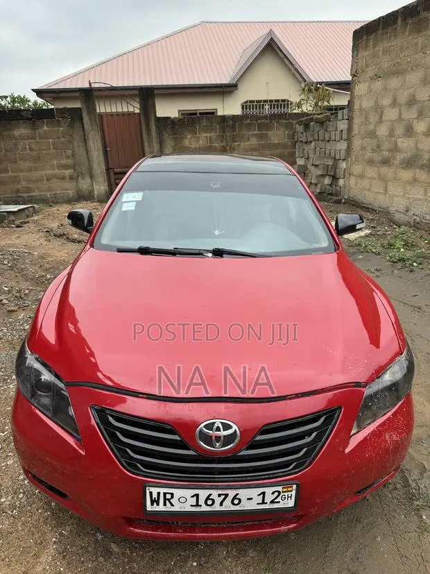 Toyota Camry Base 4dr Sedan (2.5L 4cyl 6M) 2010 Red · Photo 1