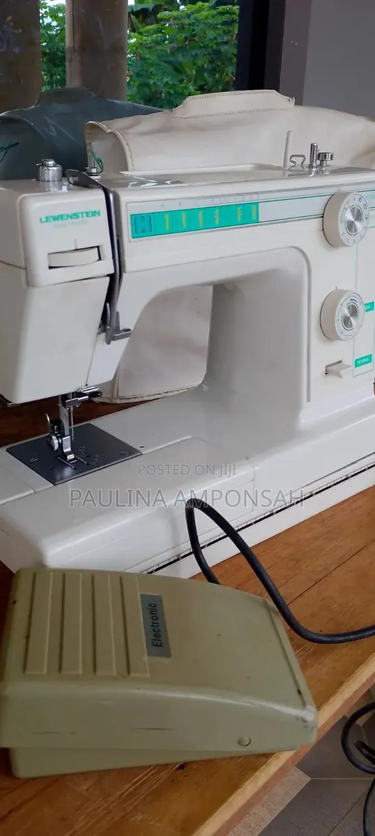 Domestic Electric Sewing Machine · Photo 1