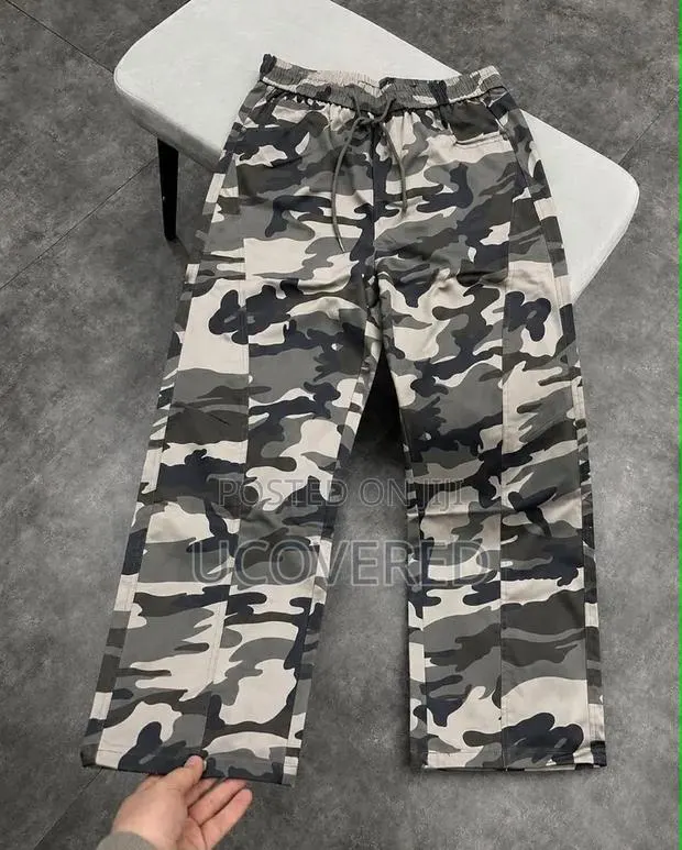 Camouflage and Solid Cargo Trousers · Photo 1