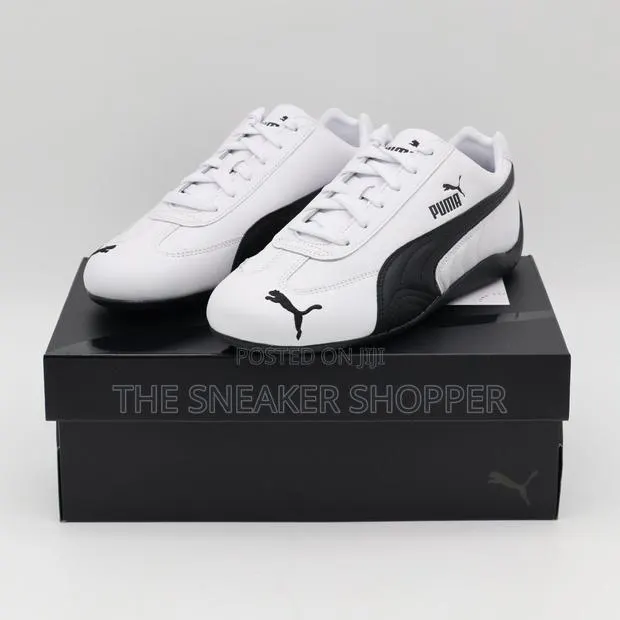 Puma Speed Cat Black and White Sneakers · Photo 1