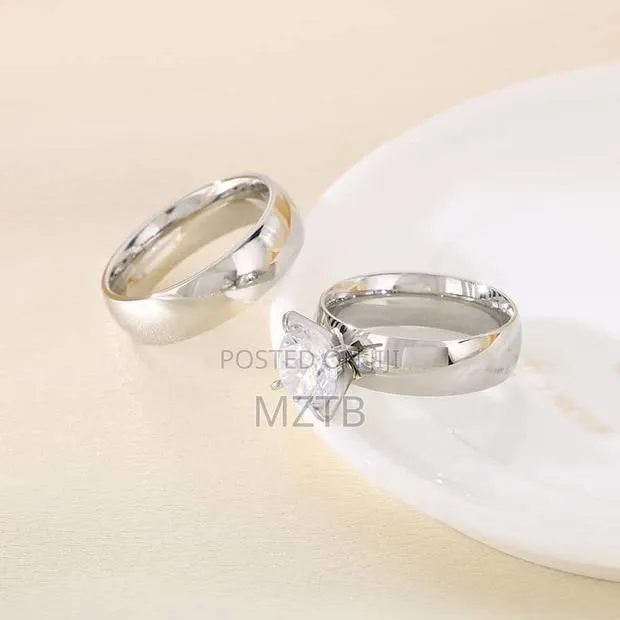 4mm Stainless Steel Couple Wedding Rings - Silver · Photo 1