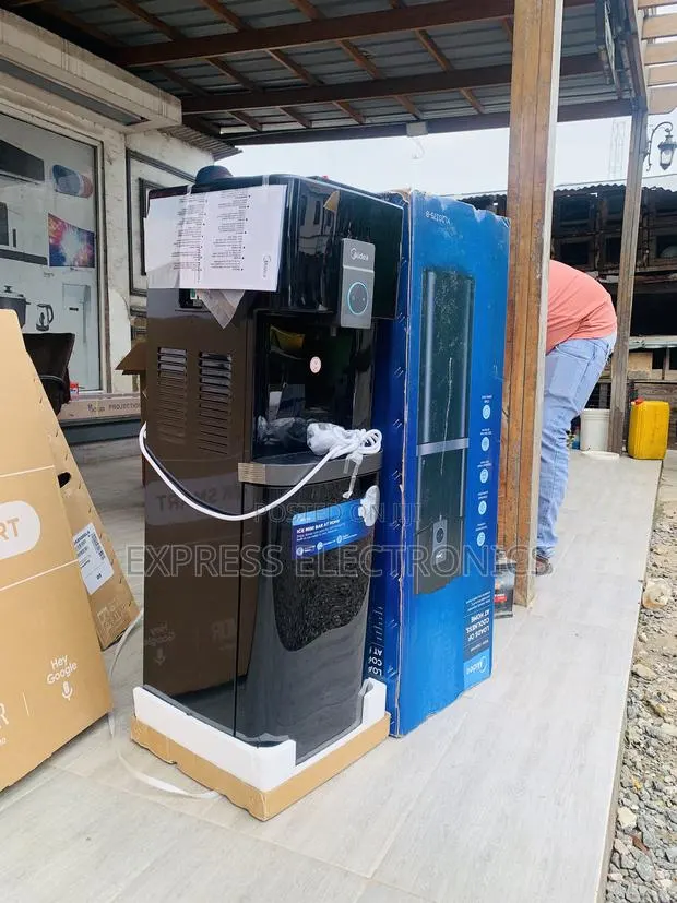 Long Lasting Midea Top Loading Water Dispenser- Black Yl2037s-B · Photo 1