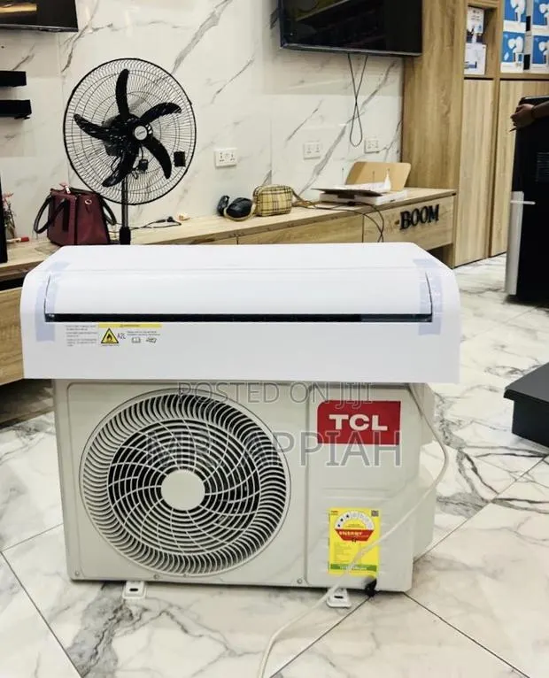 Eco-Friendly TCL 1.5hp Air Conditioner(White)R410 Gas. · Photo 1