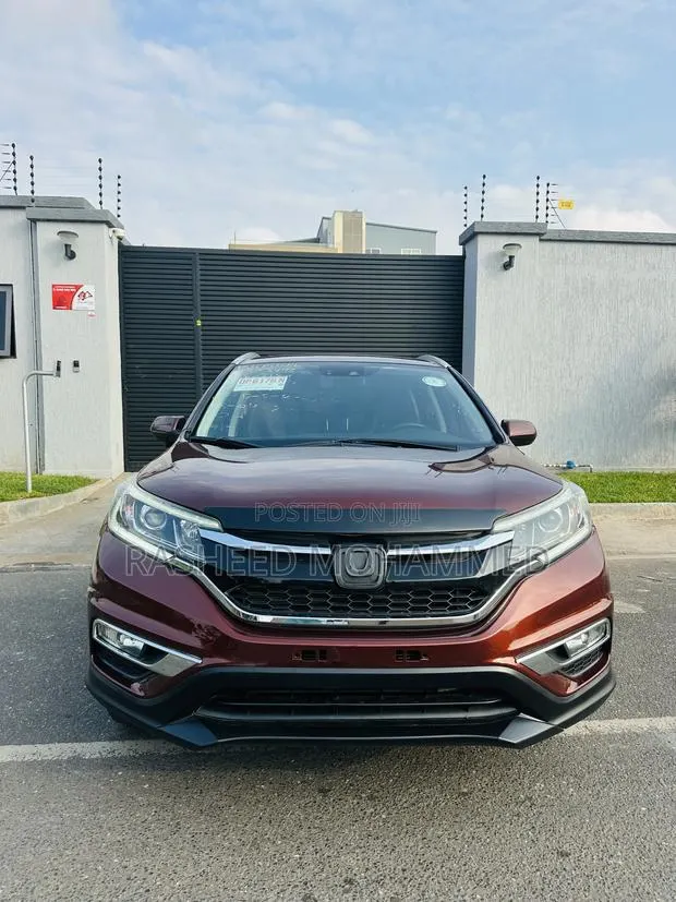 Honda CR-V Touring 4dr SUV AWD (2.4L 4cyl CVT) 2015 Burgundy · Photo 1