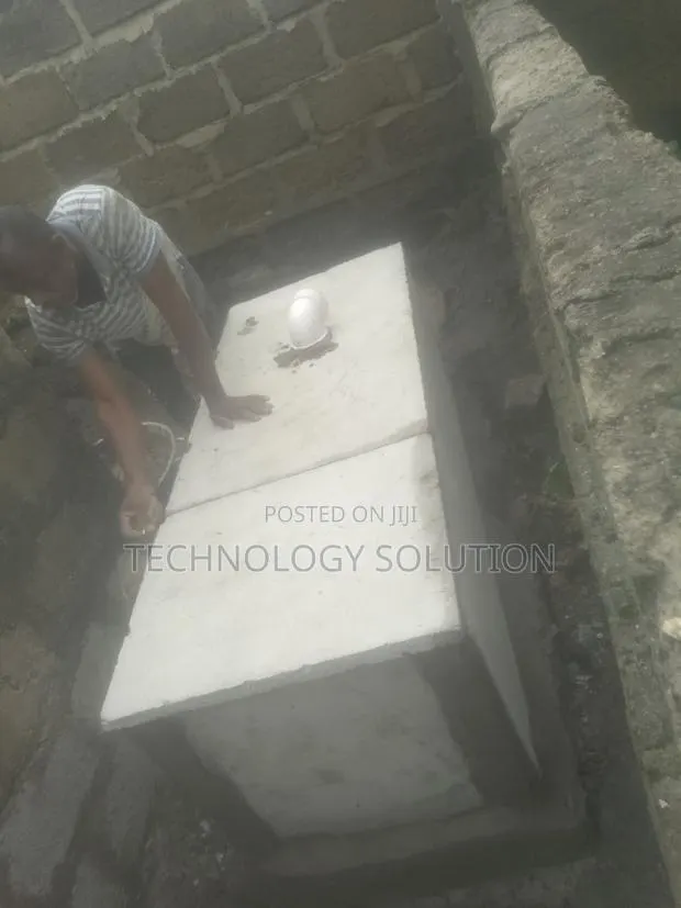 Bathroom Wc Toilet and Biodigester · Photo 1