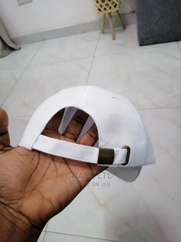 White Cap With Buckle Behind · Photo 1