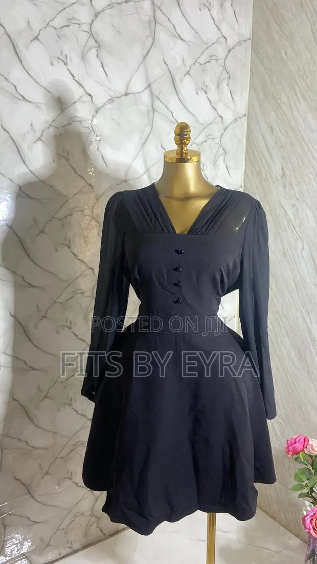 Black Long-Sleeved Fit-and-Flare Dress · Photo 1