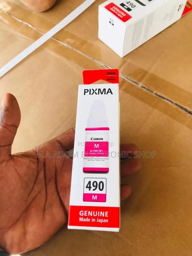 Canon GI-590 Red Ink: Your Bold Printing Choice · Photo 1