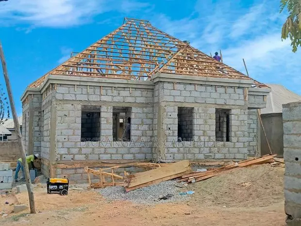 Neat Woodwork + Expert Roofing Sheet Installation · Photo 1