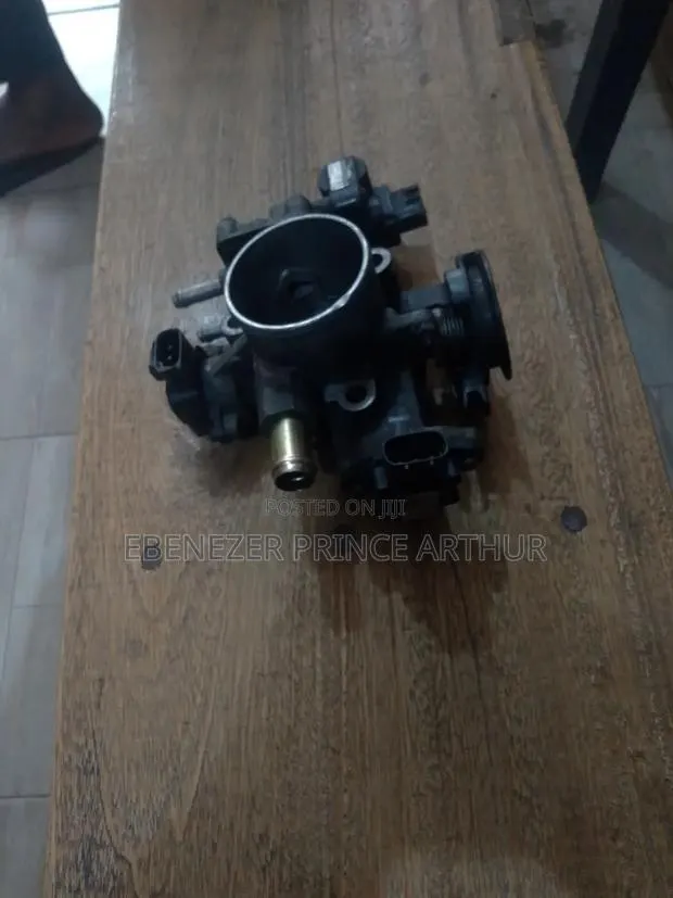 Vehicle Throttle Body · Photo 1