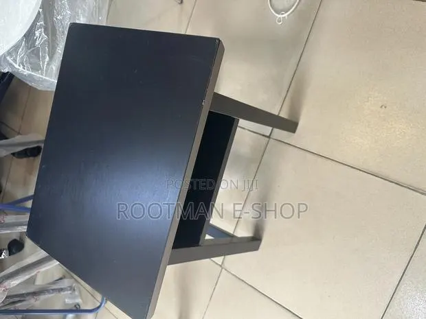 Modern Black Square End Table Featuring a Bottom Storage Sturdy Frame. · Photo 1