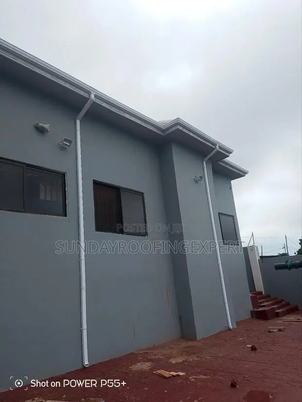 Gutter and Pipe Installation for Building