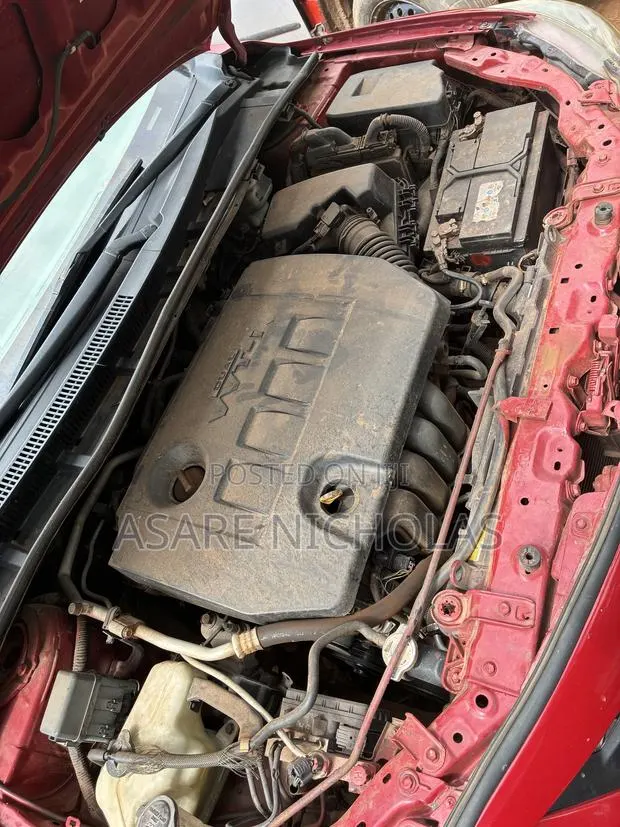 Toyota Corolla 2010 Red · Photo 1