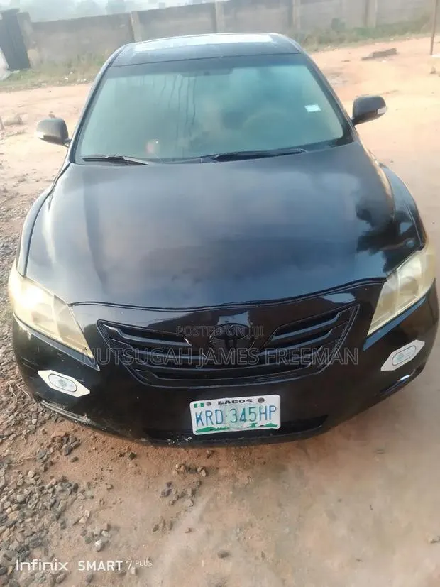 Toyota Camry 2010 Matt Black · Photo 1
