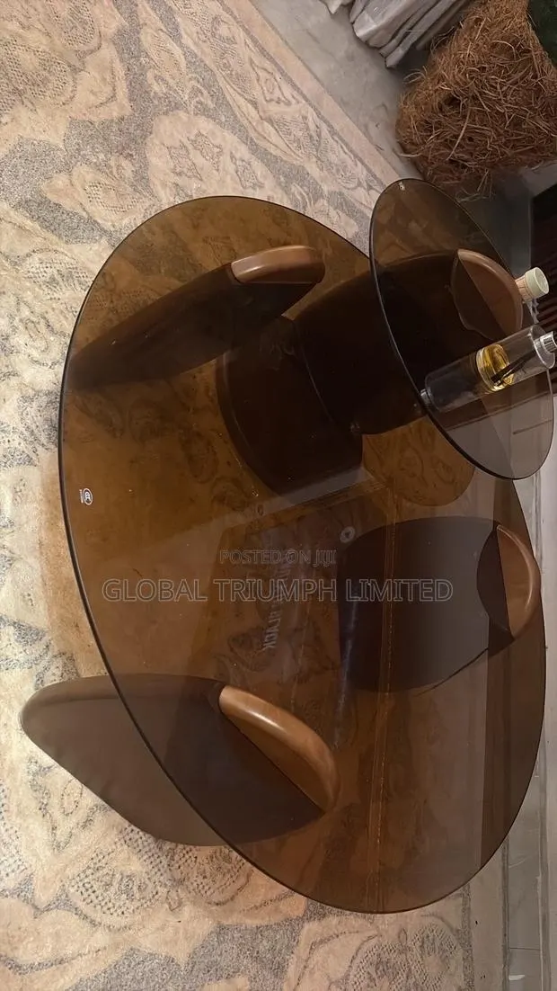Round Multi-Tiered Coffee Table Featuring Wood Finish Wooden Base · Photo 1