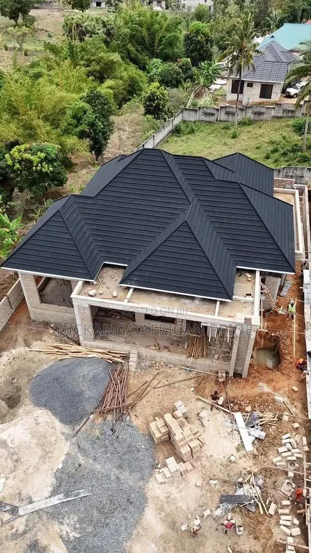 Durable Roofing That Saves You Money · Photo 1