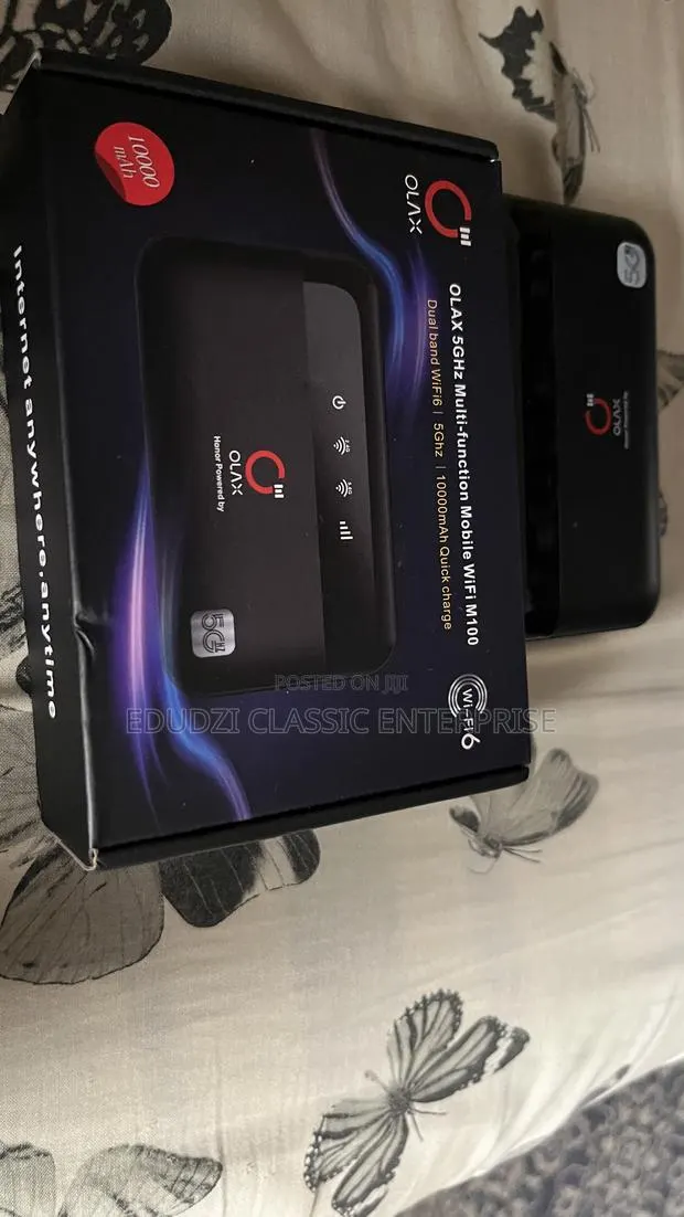 OLAX 5GHz Multi Function Mobile Wifi M100. Power Bank and WiFi · Photo 1