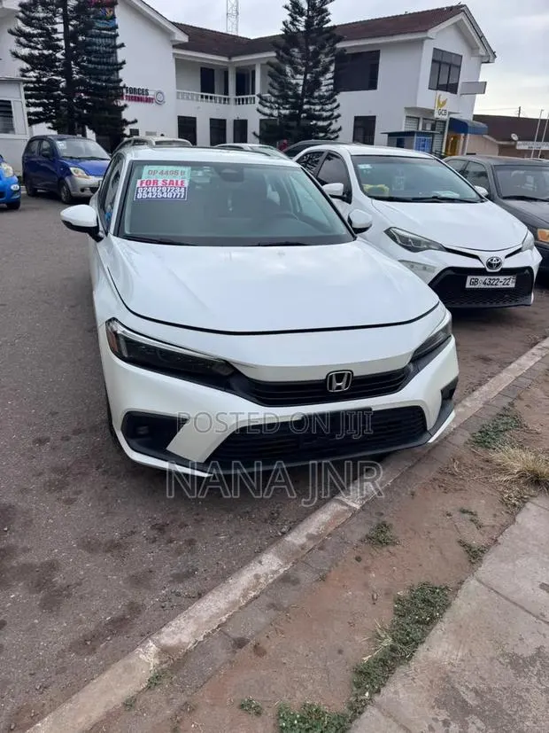 Honda Civic Touring CVT 2023 White · Photo 1