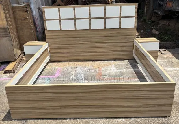 Queensize Foreign Chipboard Bed With 2 Drawers · Photo 1