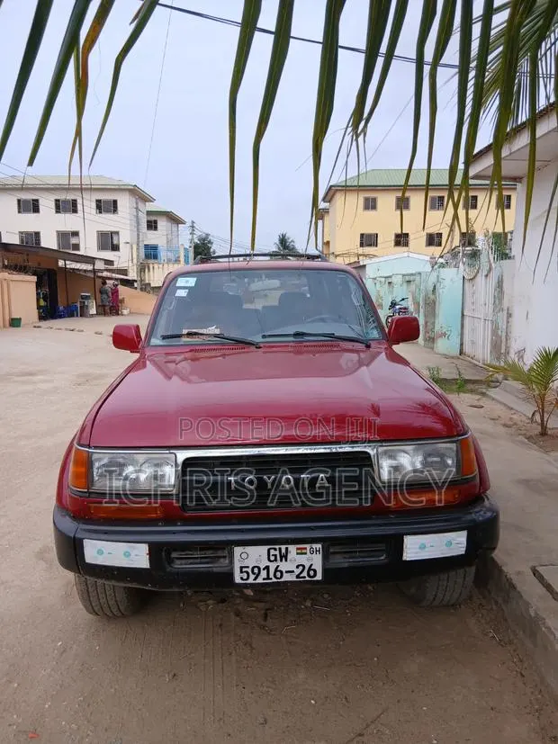 Toyota Land Cruiser 90 1997 Red · Photo 1