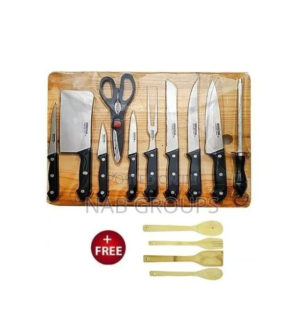 Chopping Board With Knives Set and Wooden Spoons · Photo 1