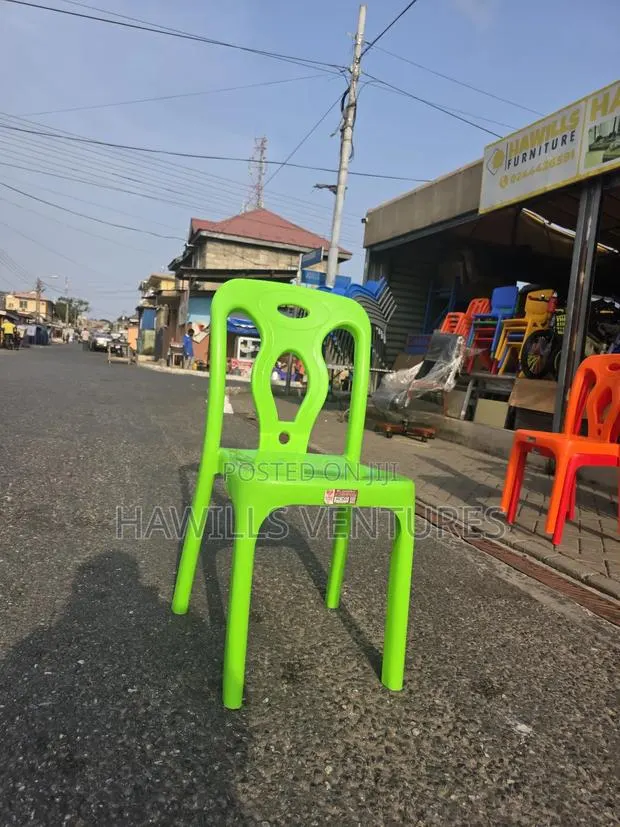 Green Stankable Plastic Armless Chair · Photo 1
