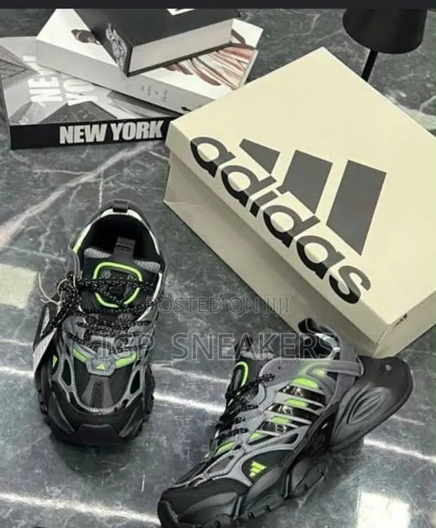 Adidas XLG Runner Deluxe Sneakers · Photo 1