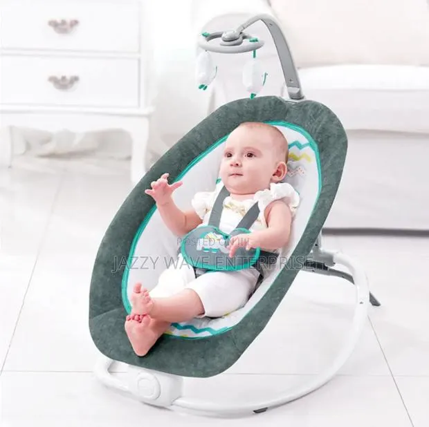 Baby Swing or Bouncer · Photo 1