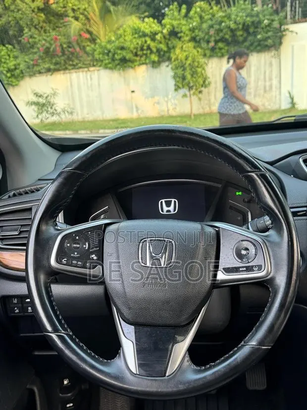 Honda CR-V Touring 4dr SUV AWD (1.5L 4cyl CVT) 2017 Gray · Photo 1