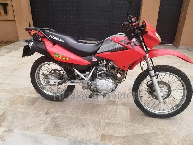 Honda 1999 Orange · Photo 1