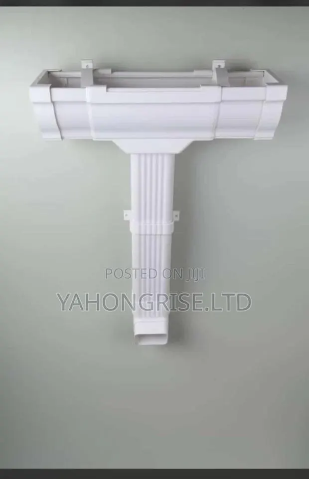 White PVC Downspout and Gutters · Photo 1