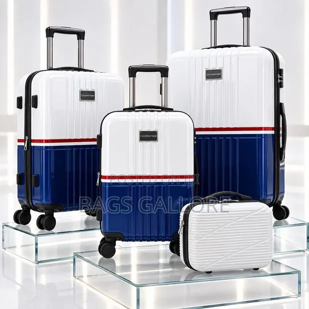 White and Blue Mixed Luggage · Photo 1