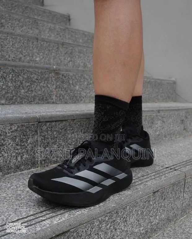 Adidas Adizero EVO SL Sneakers in Black and Metallic Silver Colorway · Photo 1