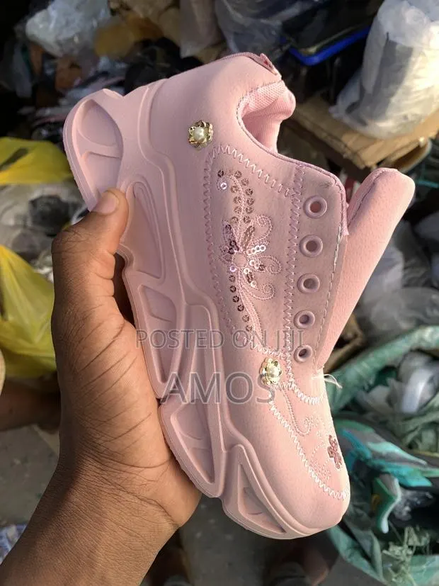 Women Pink Sneakers · Photo 1