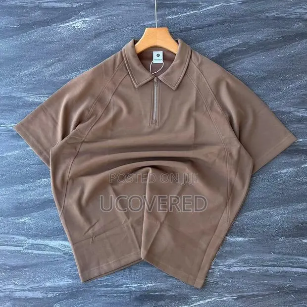 Half-Zip/Button Jersey-Knit Polo Shirt · Photo 1