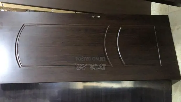 A Brown Like Fully Wooden Door With All Accessories · Photo 1