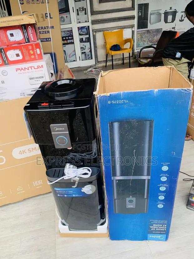 Place Your Order for Midea Top Loading Water Dispenser- Black Yl2037s- · Photo 1