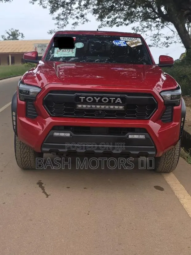 Toyota Tacoma 2025 Red ยท Photo 1