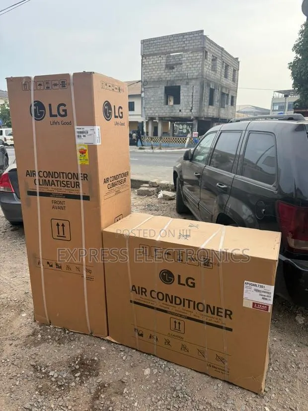 Grab the New White Lg Floor Standing Air Conditioner 5hp · Photo 1