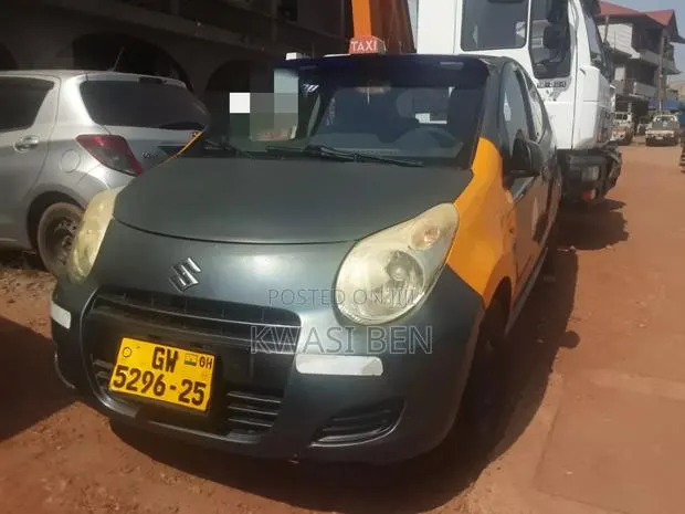 Suzuki Alto 1.0 2010 Gray · Photo 1