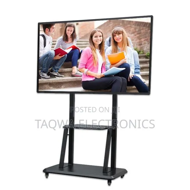 Supports TVS From 32-75 Movable Tv Stand · Photo 1